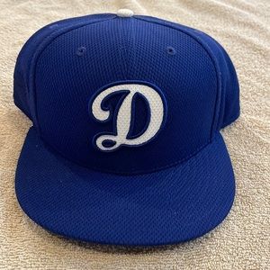 Los Angeles Dodgers spring training hat.